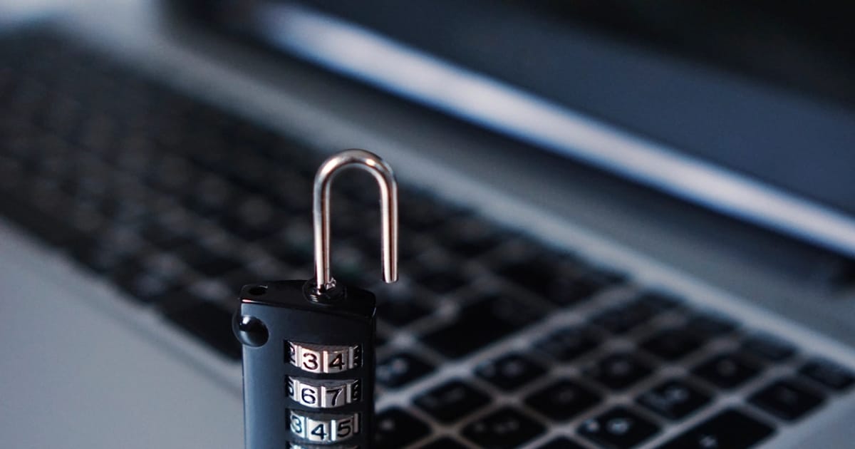 A padlock on a computer keyboard